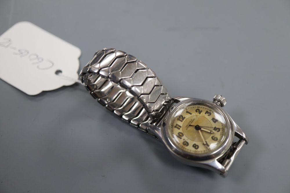 A boys size 1940s stainless steel Oyster Junior Sport manual wind wrist watch, on associated bracelet.